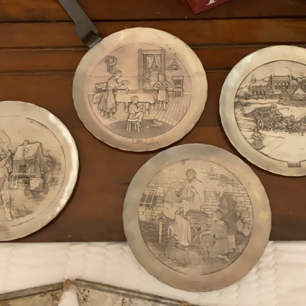 Set a four limited edition, pewter Christmas plates